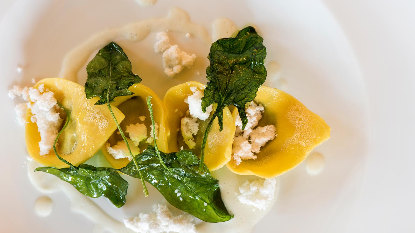 Un piatto di ravioli realizzati presso il Ristorante ad Asolo